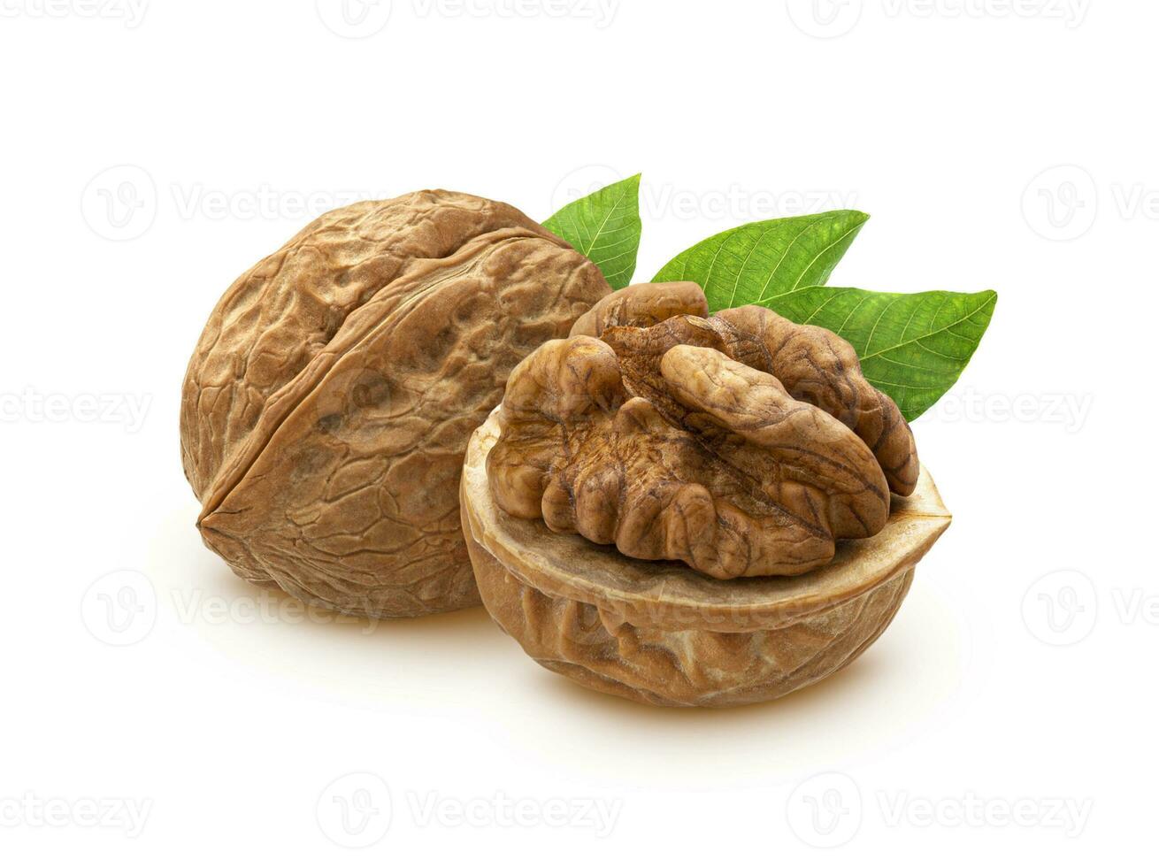 Walnuts with leaves isolated on white background photo
