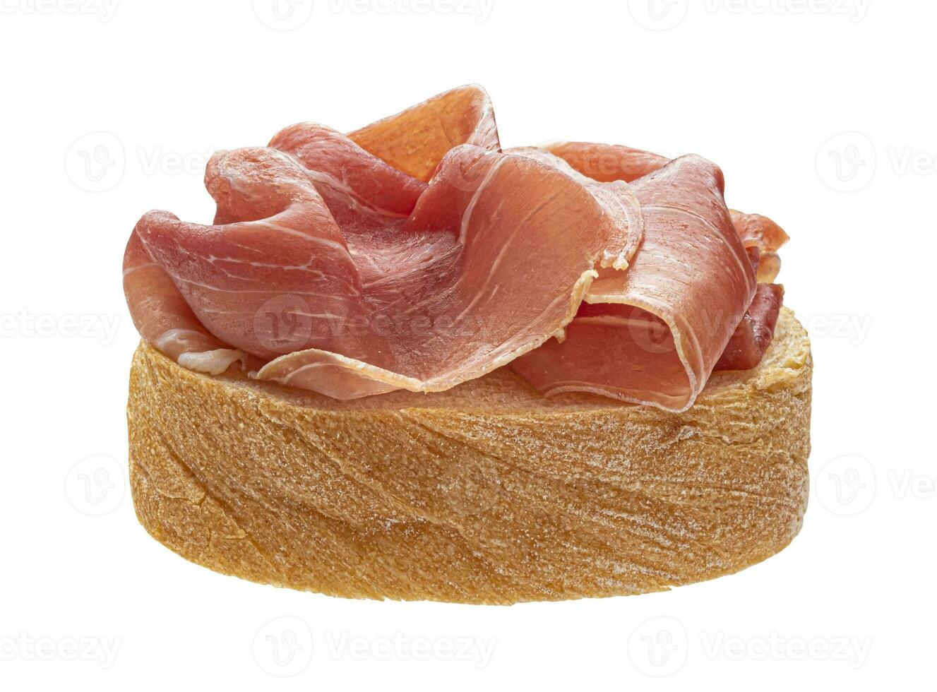 Bruschetta with bacon isolated on white background photo