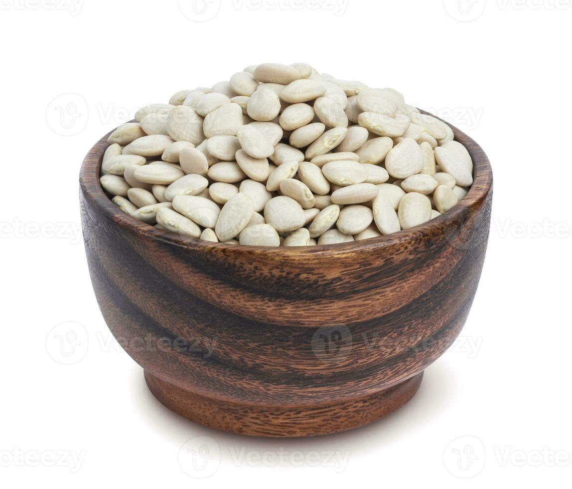 White kidney beans in wooden bowl isolated on white background photo