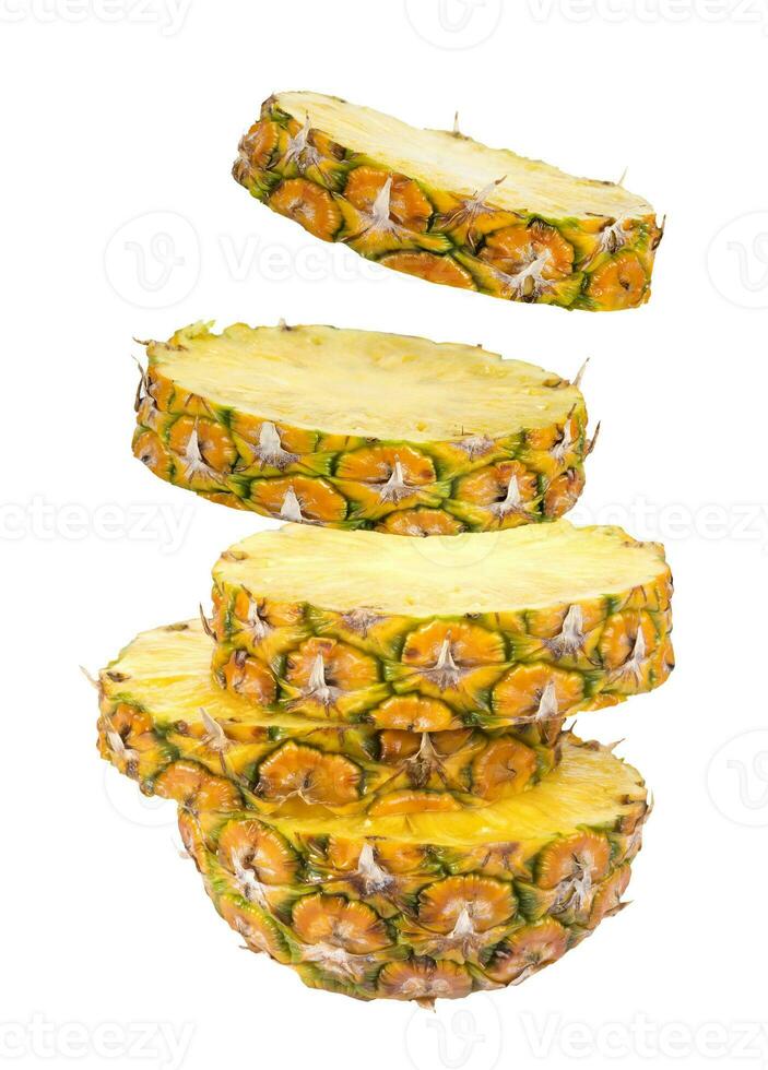 Slices of pineapple isolated on white background photo