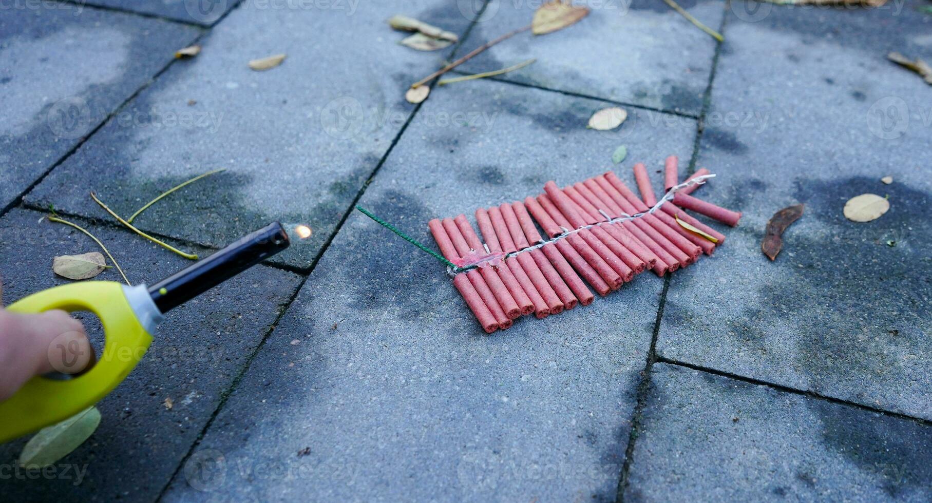 Firecrackers strip on the ground photo