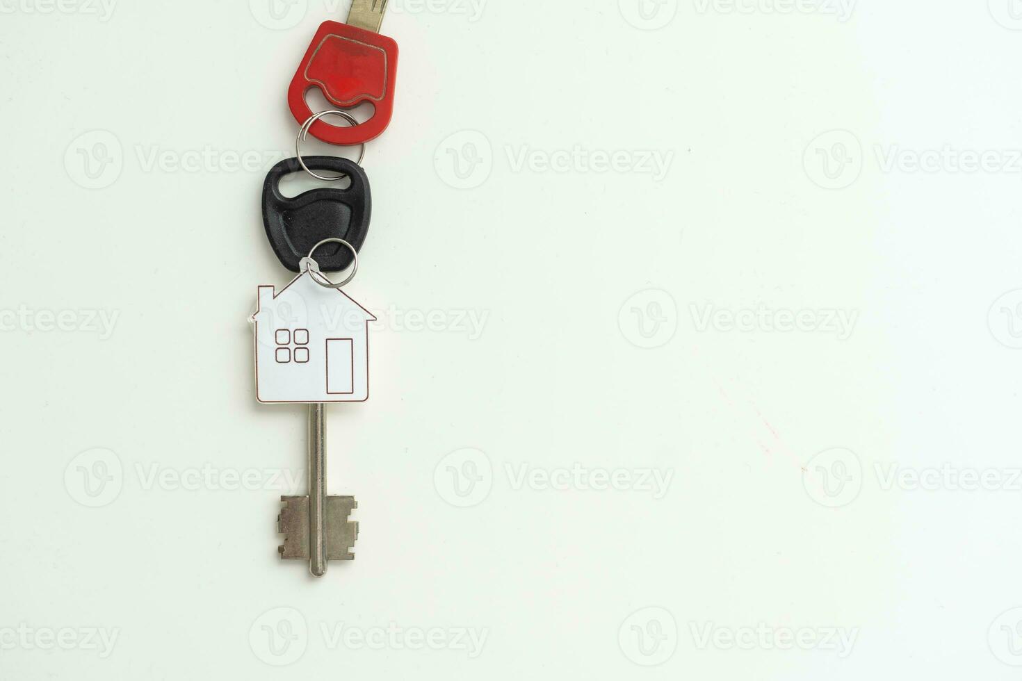 House keys with keychain. Isolated on white background photo