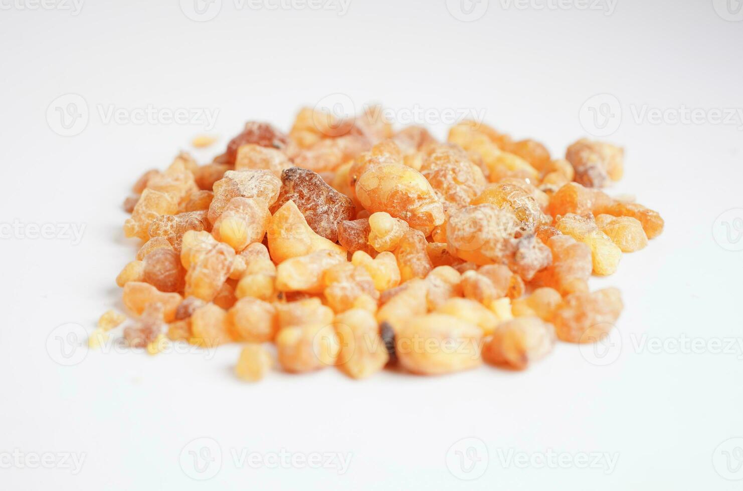 Frankincense or olibanum aromatic resin isolated on white background used in incense and perfumes. photo