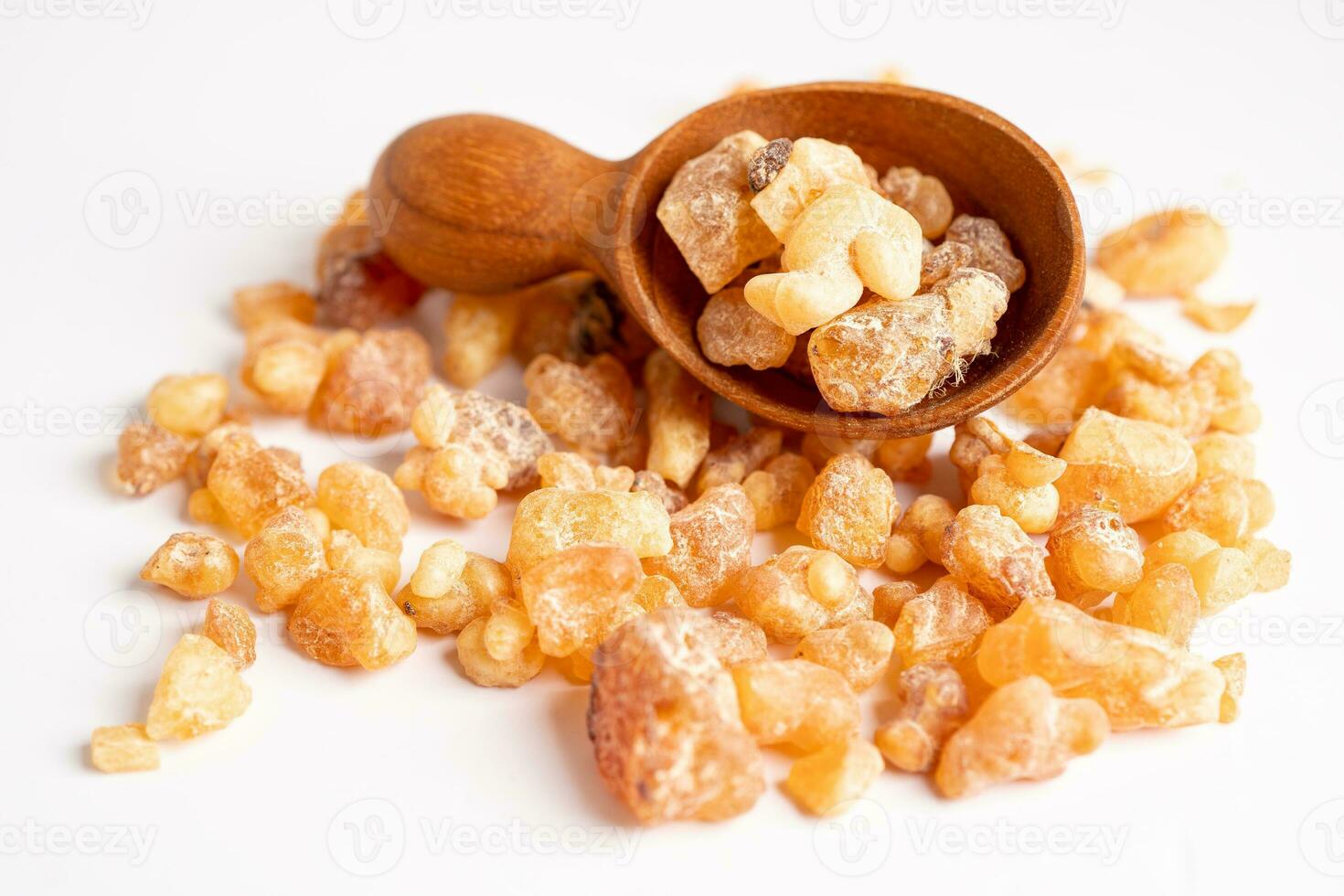 Frankincense or olibanum aromatic resin isolated on white background used in incense and perfumes. photo