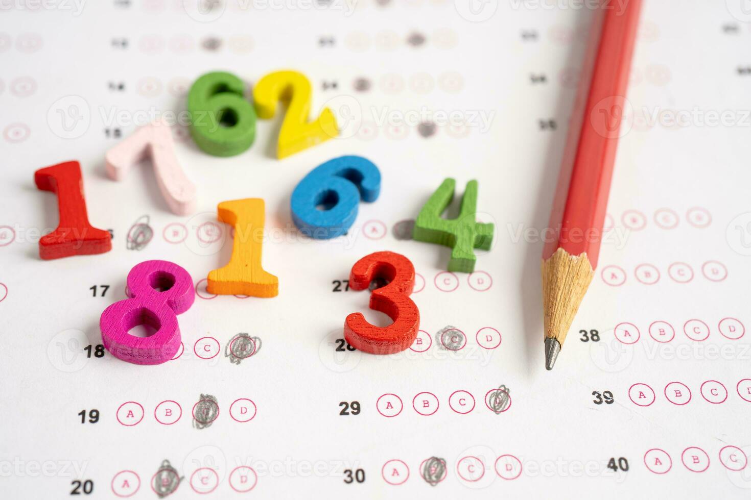 Math number and pencil on answer sheet paper, Education study testing learning teach concept. photo