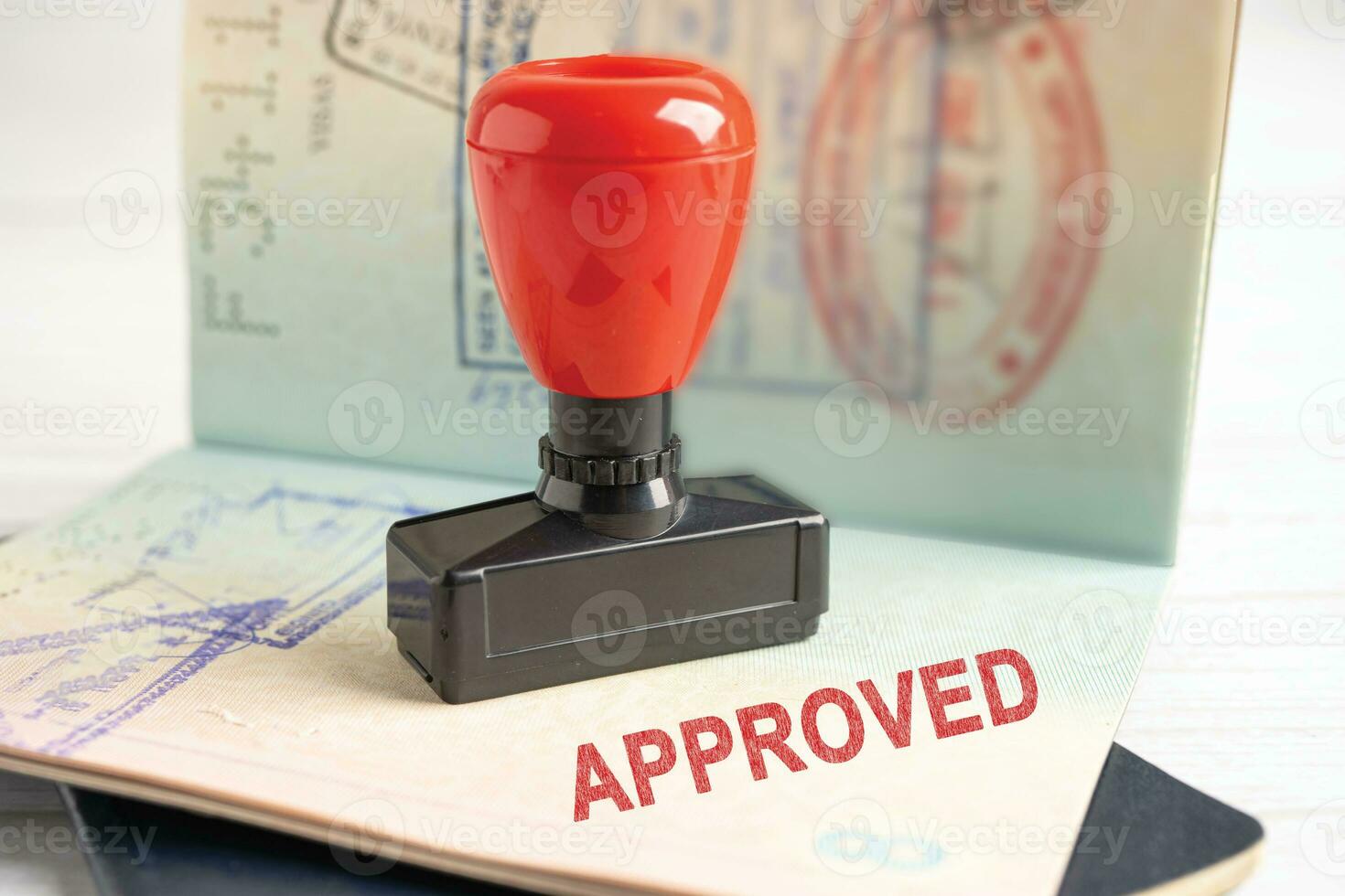 Approved Stamp visa and passport document to immigration at airport in country. photo