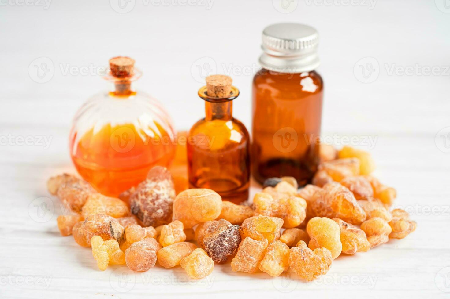 Frankincense or olibanum aromatic resin isolated on white background used in incense and perfumes. photo