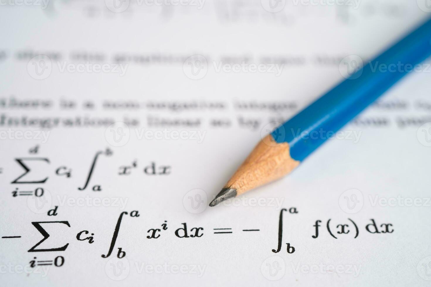 Pencil on mathematic formula exercise test paper in education school. photo