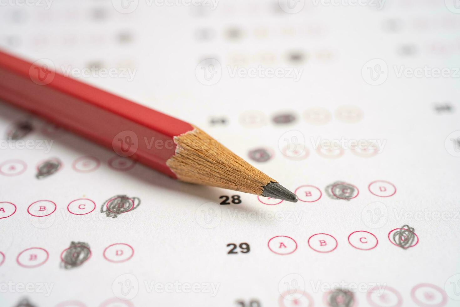 Answer sheets with pencil drawing fill to select choice, education concept. photo