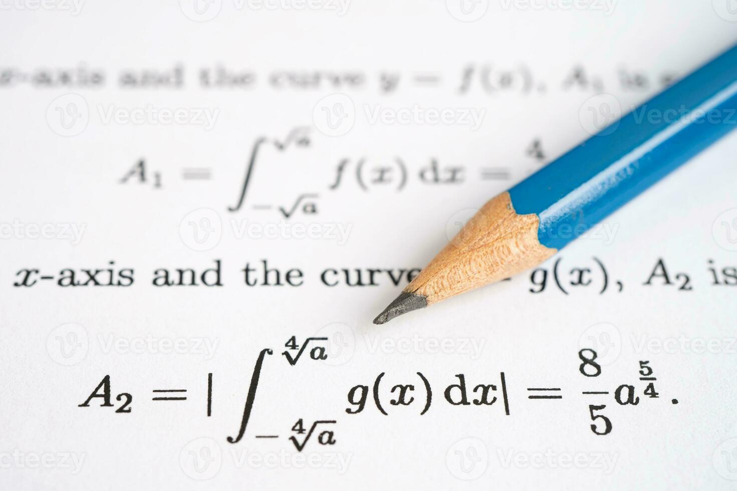 Pencil on mathematic formula exercise test paper in education school. photo