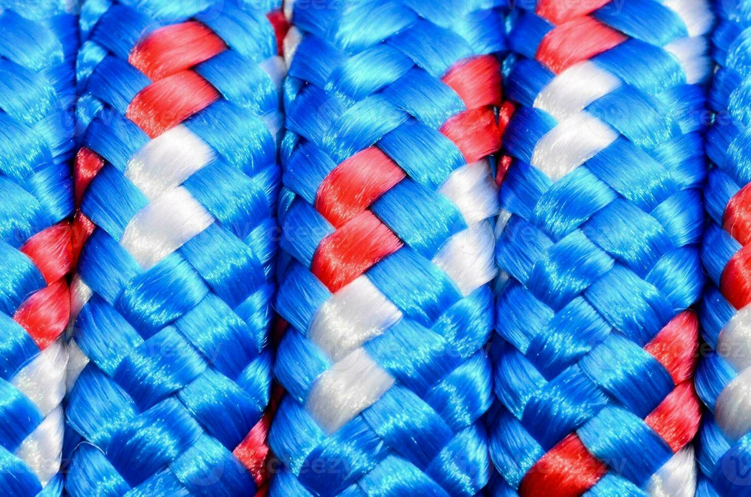 blue, red and white braided rope photo