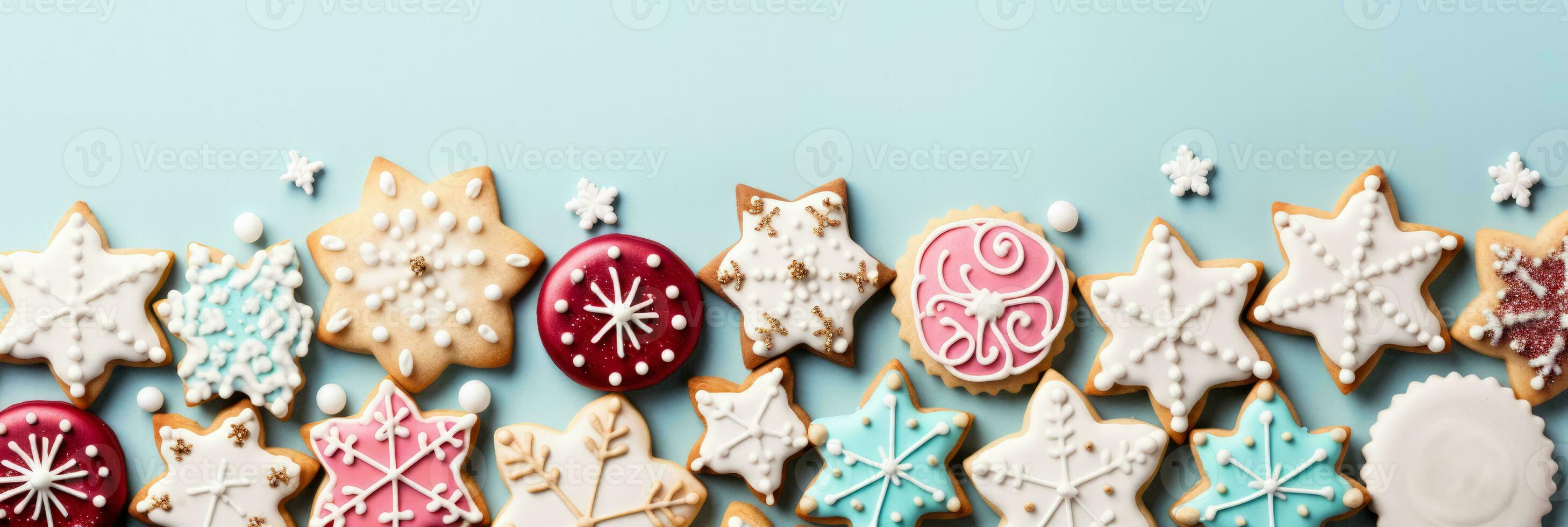 Magical sugar icing Christmas cookies on pastel hues background with empty space for text photo