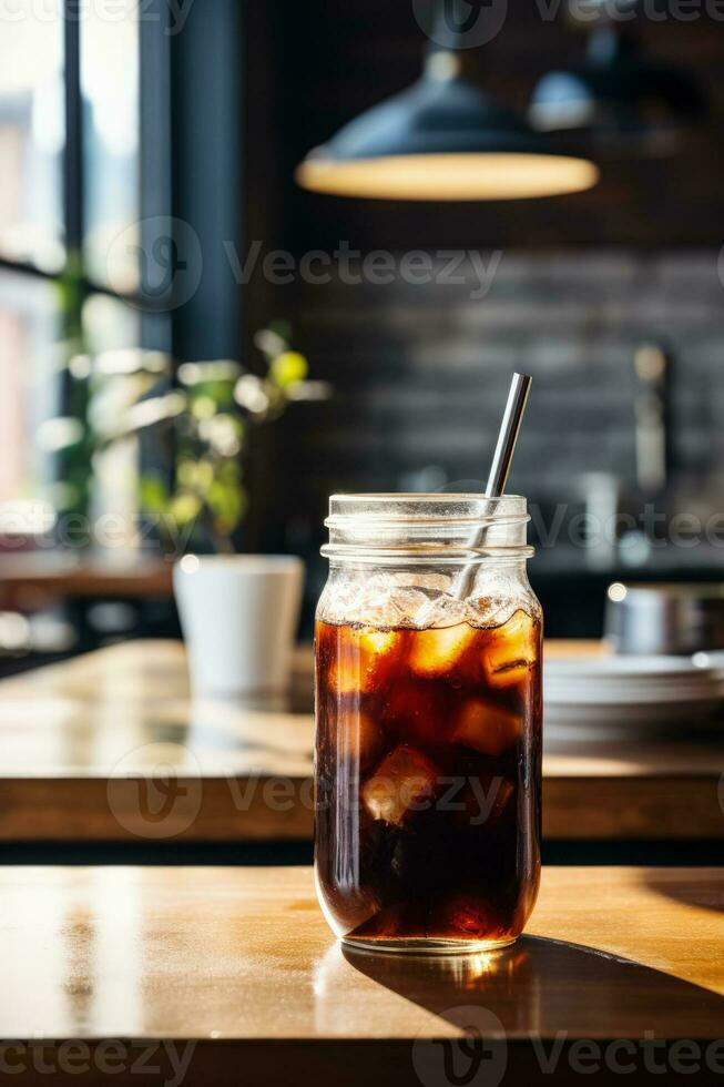 Artisanal cold brew coffee in industrial chic cafeteria background with empty space for text photo