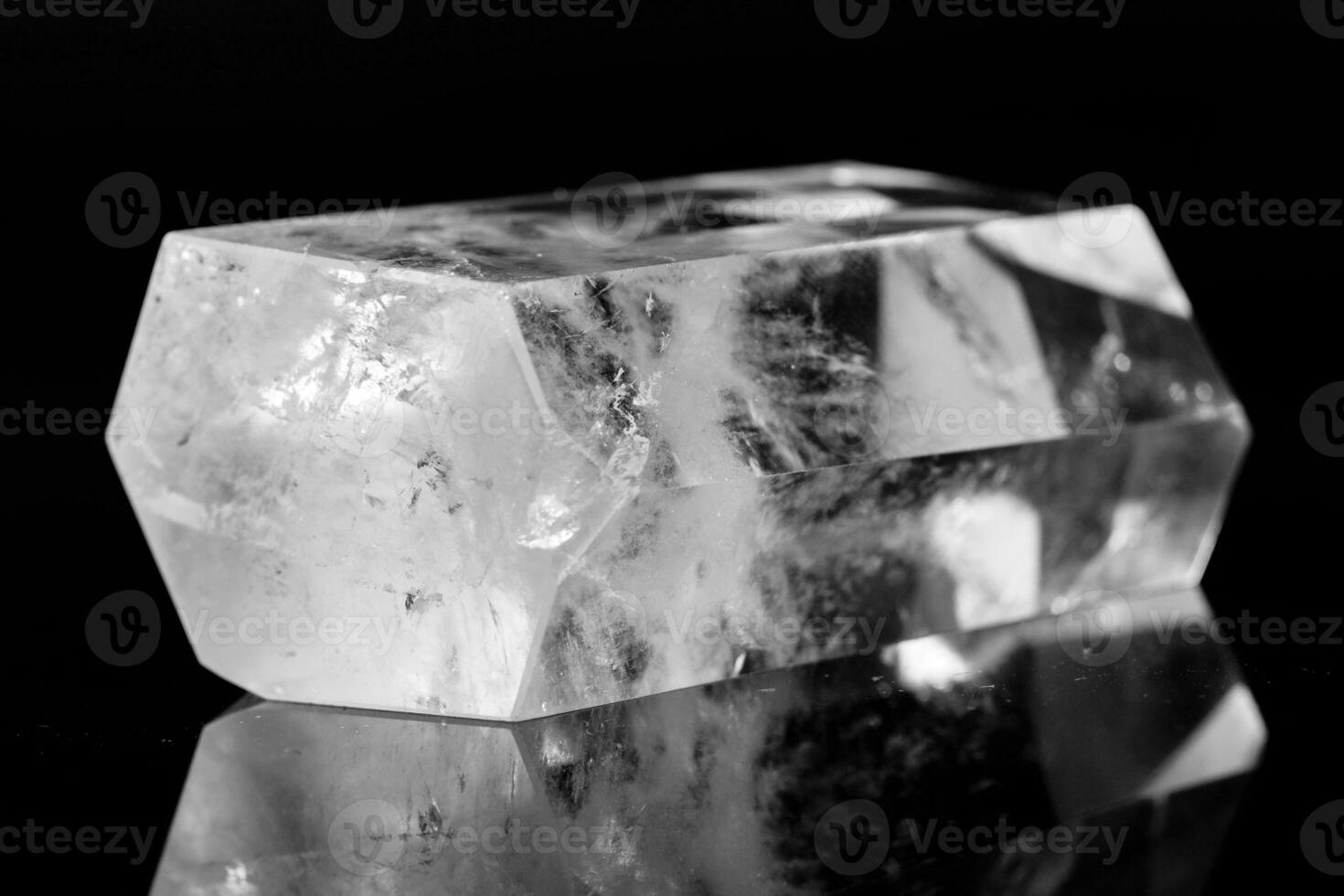 Macro mineral stone Crystal rock crystal on a black background photo