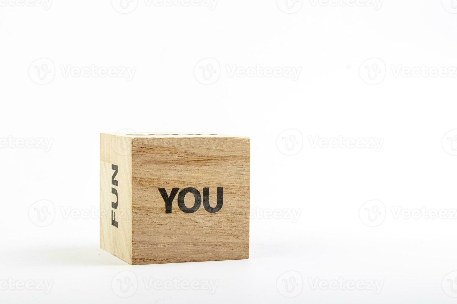 Wooden cubes with the inscription you on a white background photo