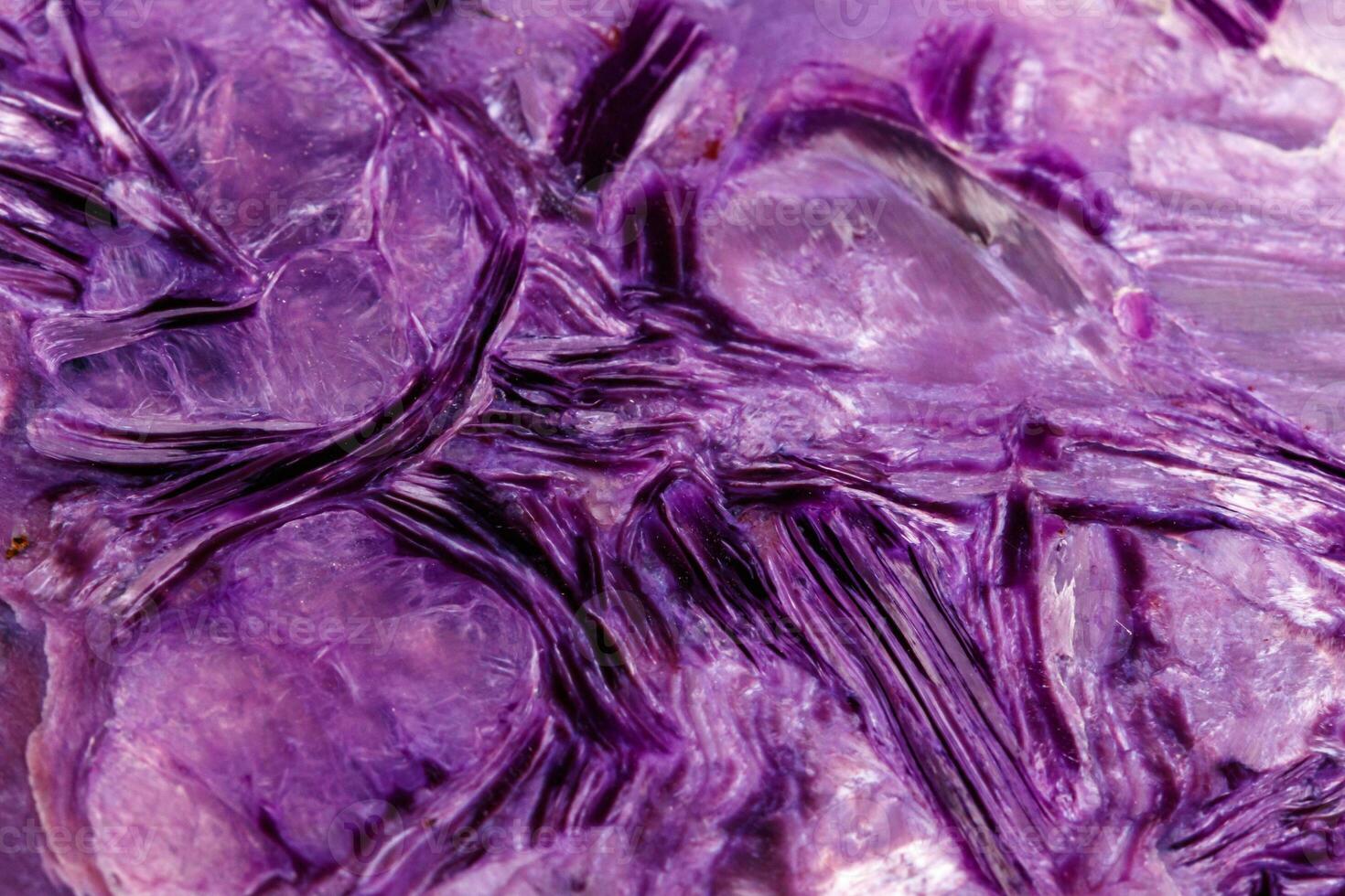 Macro stone mineral Charoite on a white background photo