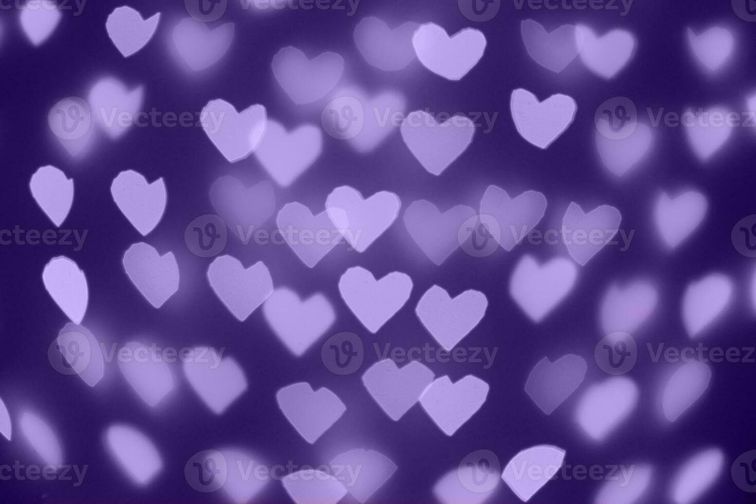 beautiful hearts made of lights on a blurred background photo