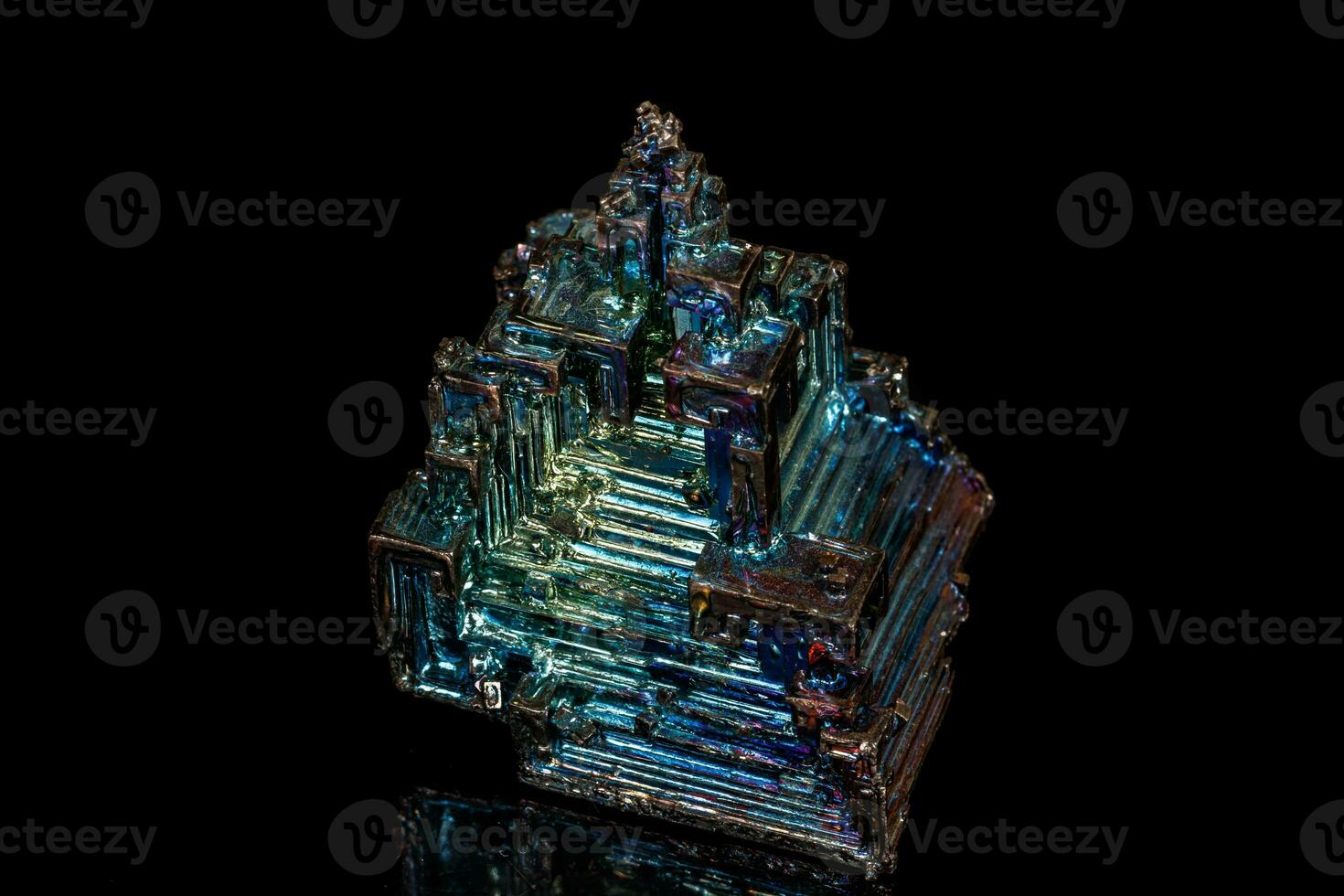 Macro of the stone bismuth mineral on a black background photo