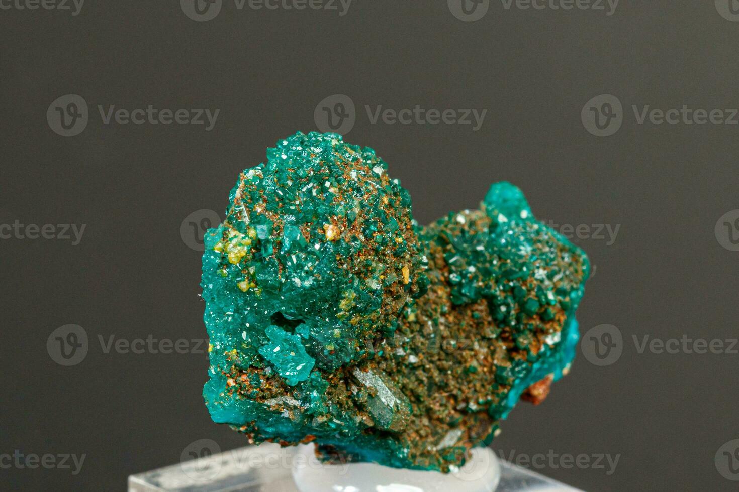 Macro mineral stone Dioptase Pyromorphite on a black background photo