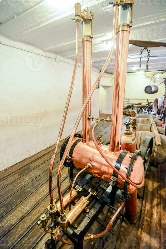a steam engine is on display in a room photo