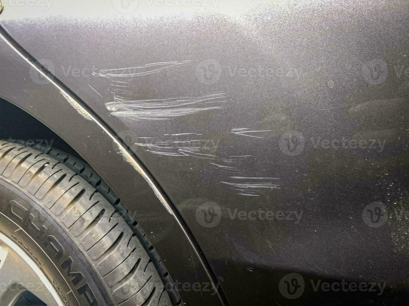 scratches on the car door photo