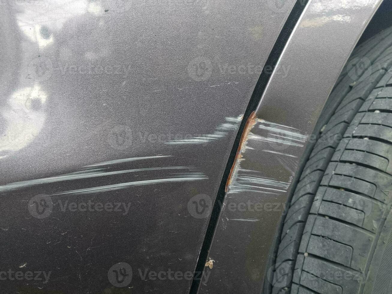 scratches on the car door photo