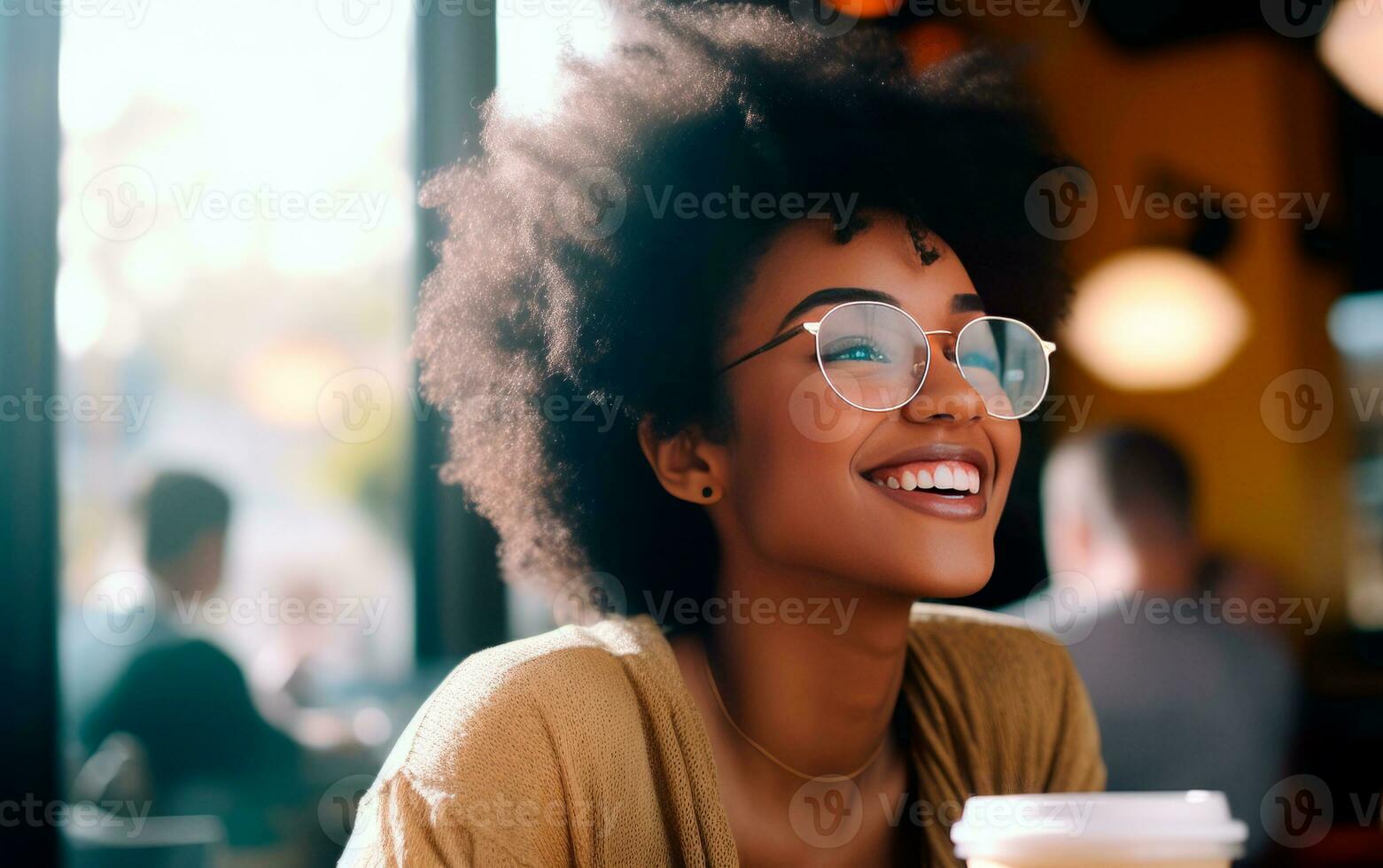 Young woman having a coffee on a cafeteria. Freelance or student girl having a break. photo