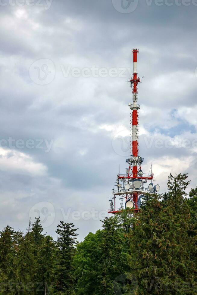 telecommunication tower at a hills. Vertical view photo