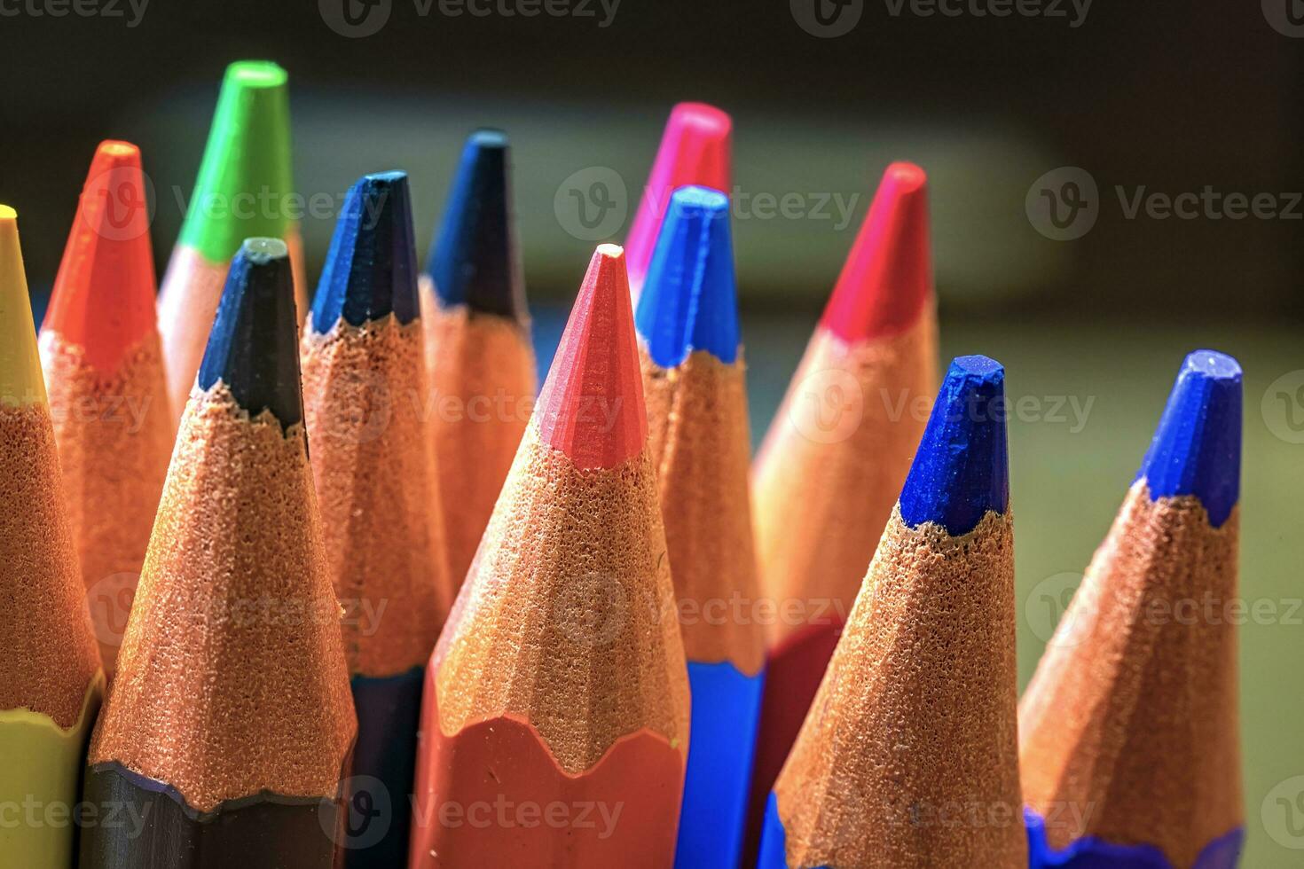 Macro background of the pencil as an element for design. Colored pencils closeup photo