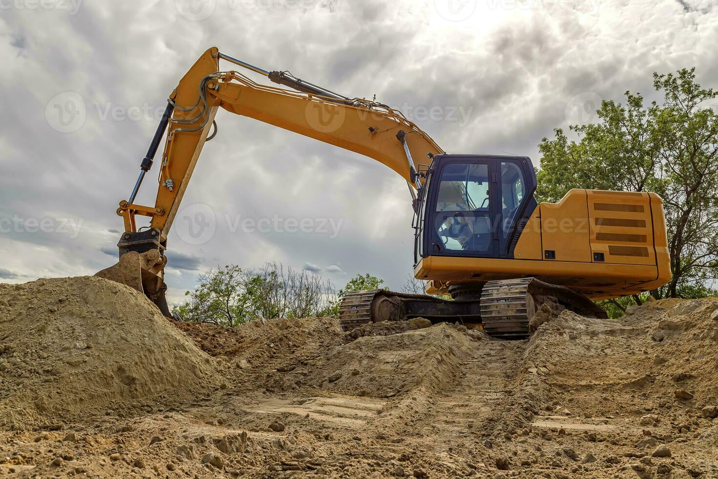 Big excavator with shovel at construction site. Horizontal view photo