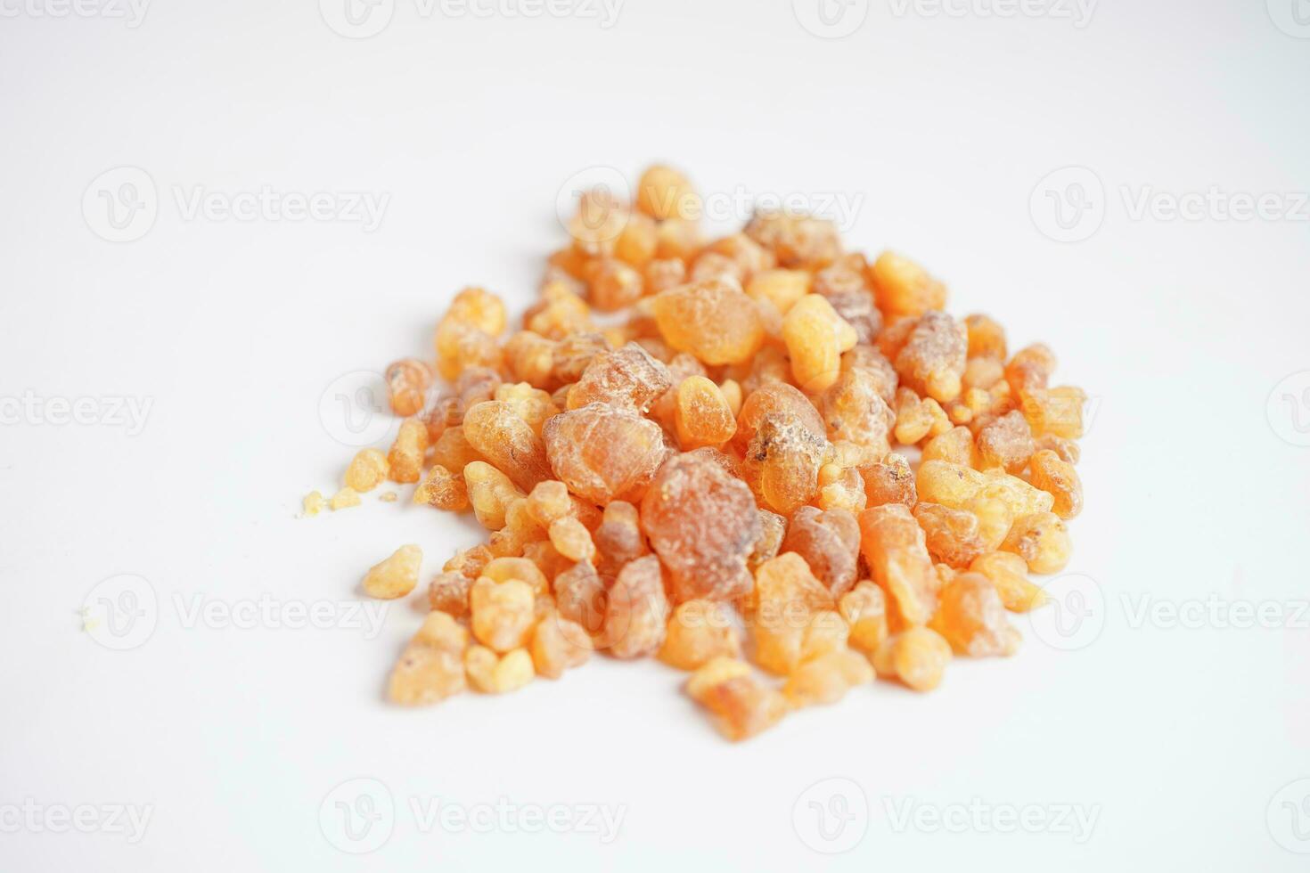 Frankincense or olibanum aromatic resin isolated on white background used in incense and perfumes. photo