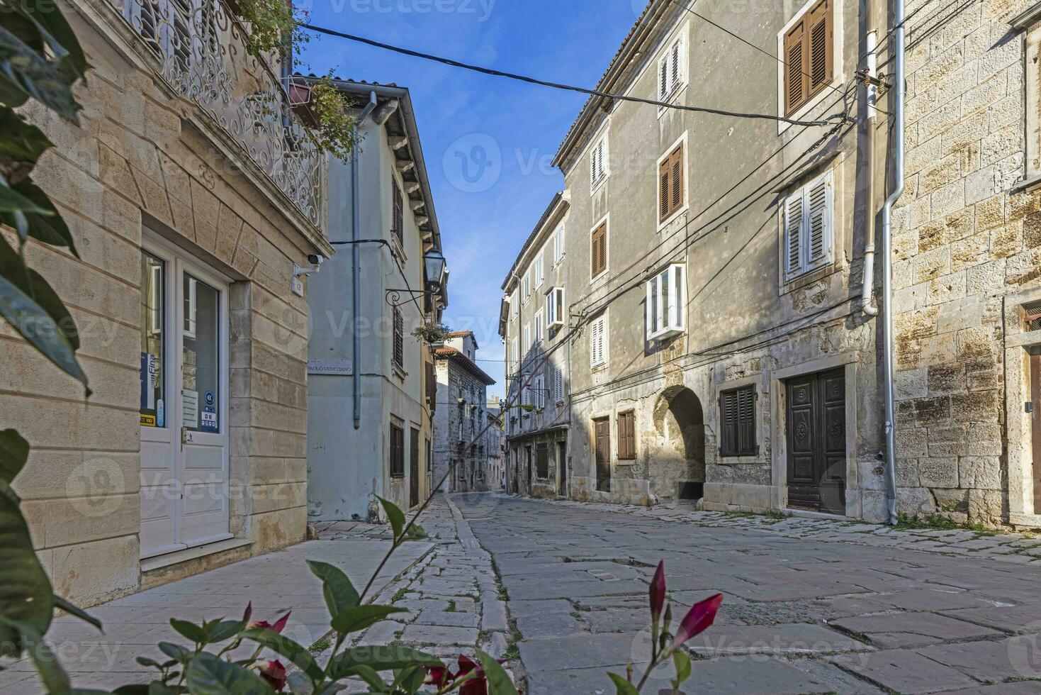 Picture from the town of Groznjan with idyllic cobbled streets and buildings made of natural stone photo