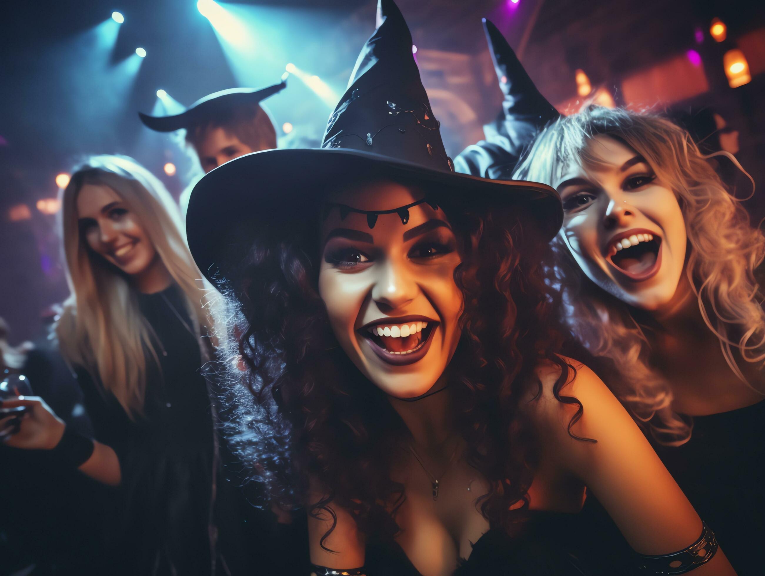 Group Of Young People Wearing Costumes At Halloween Party Drinking group-of-young-people-wearing-costumes-at-halloween-party-drinking