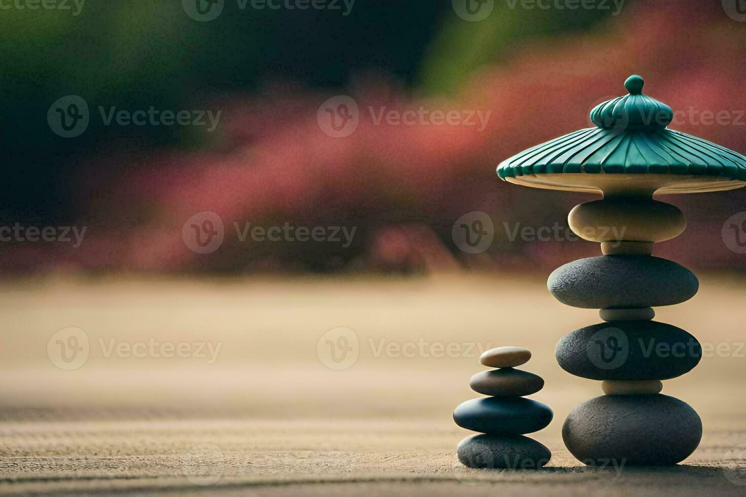 a stack of stones and a green umbrella. AI-Generated photo