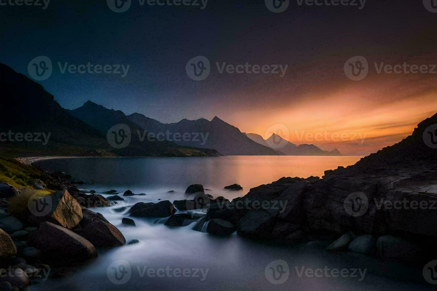 a beautiful sunset over the ocean and mountains. AI-Generated photo