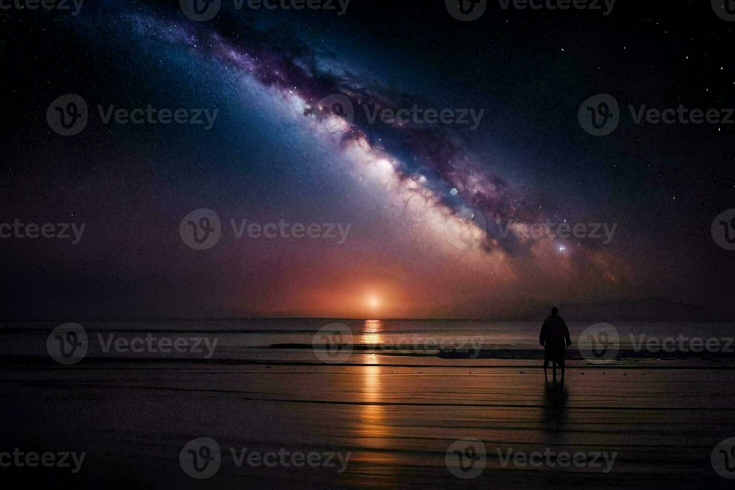 a person standing on the beach looking at the milky. AI-Generated photo