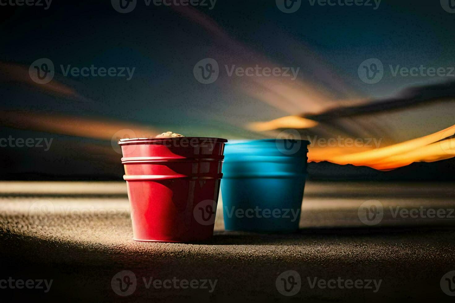 two red cups sitting on a table with a sunset in the background. AI-Generated photo