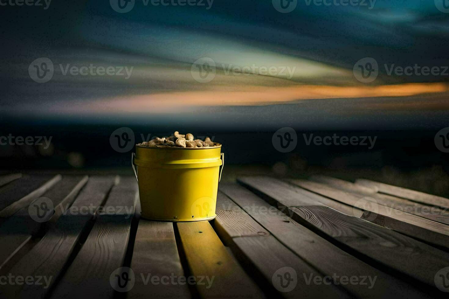 a yellow bucket sitting on a wooden table with a sunset in the background. AI-Generated photo