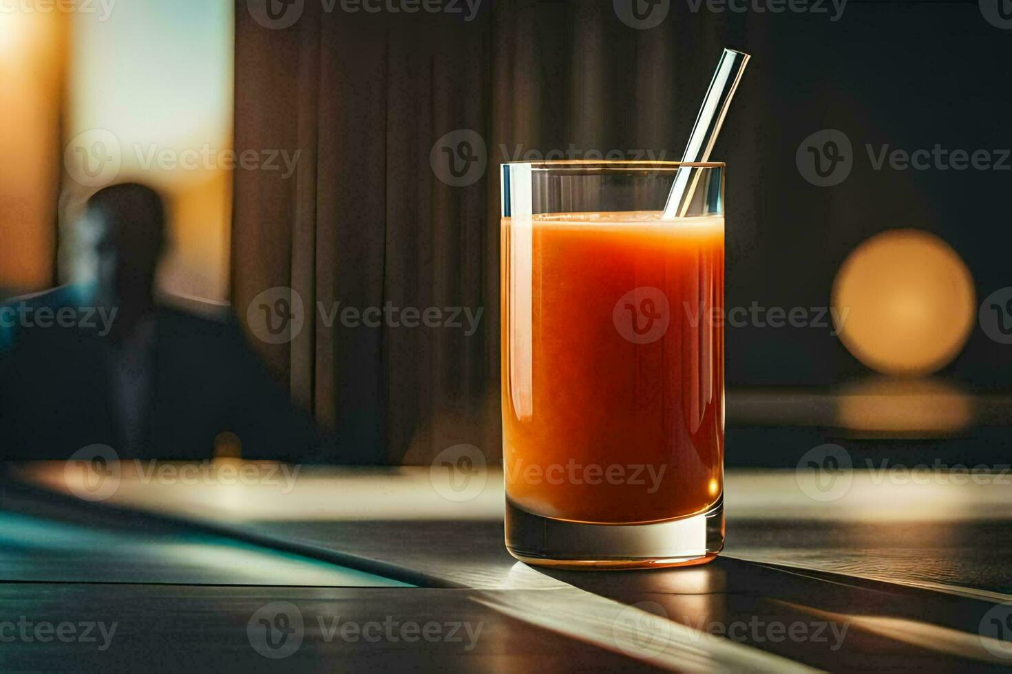 a glass of juice with a straw sitting on a table. AI-Generated photo