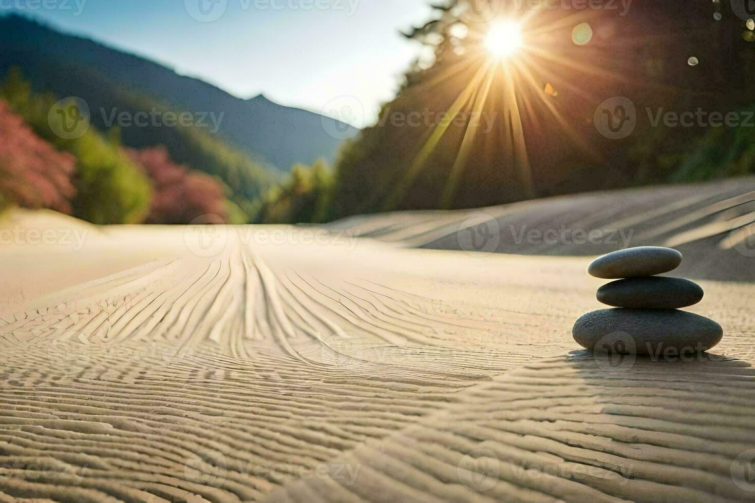 a stack of stones on the sand in front of a mountain. AI-Generated photo