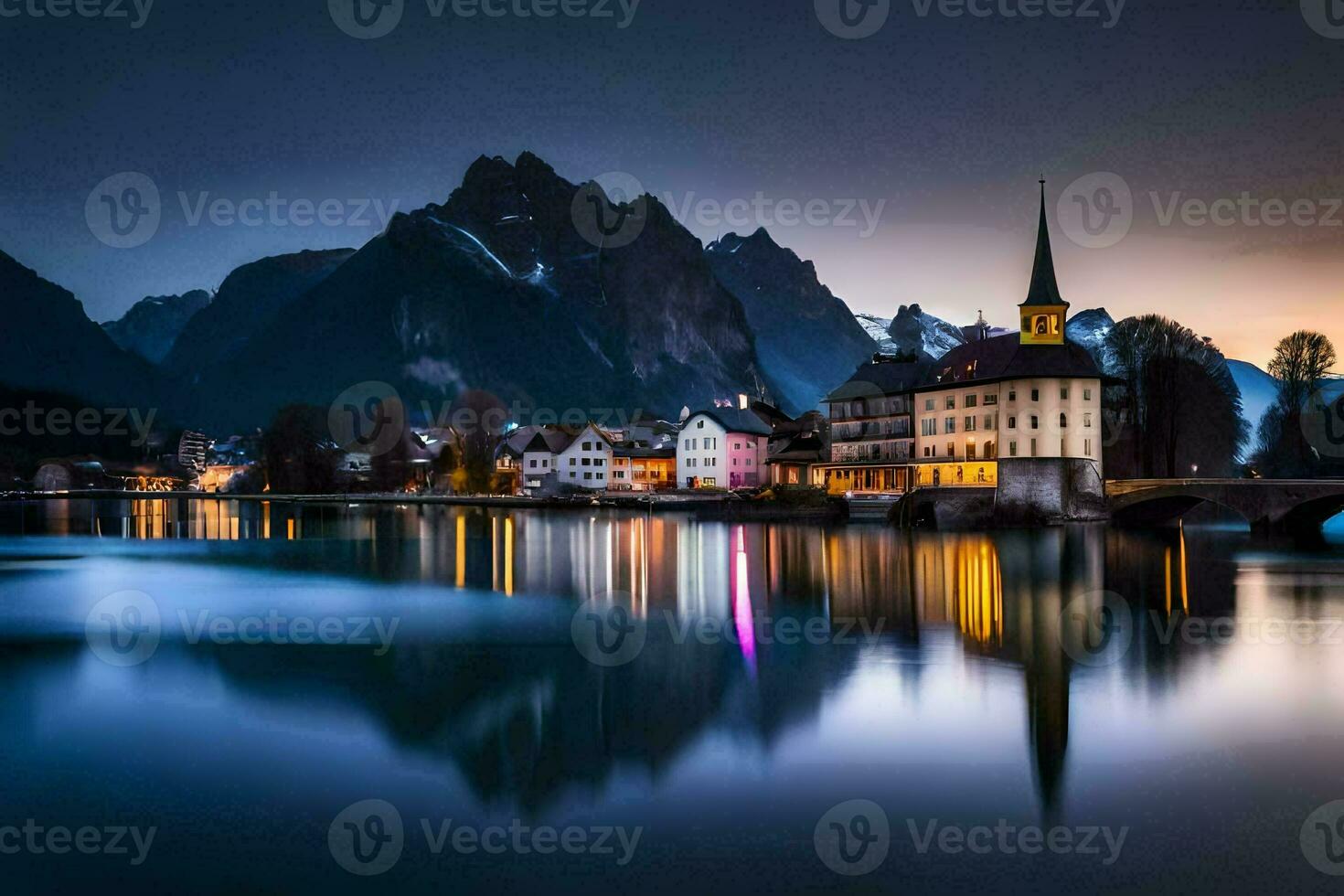 a town and mountains in the background at dusk. AI-Generated photo