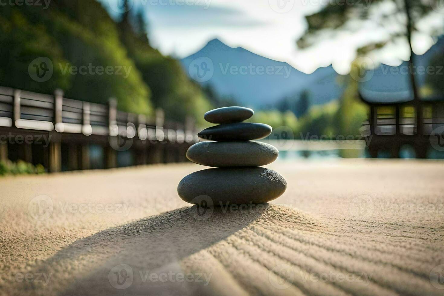 a stack of rocks on the beach in front of a lake. AI-Generated photo
