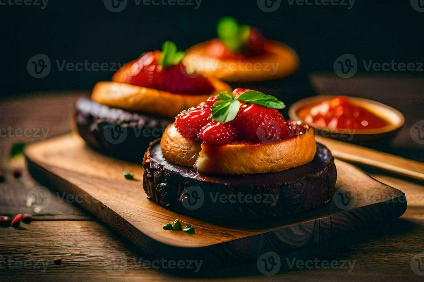 three small cakes with strawberries on top. AI-Generated photo