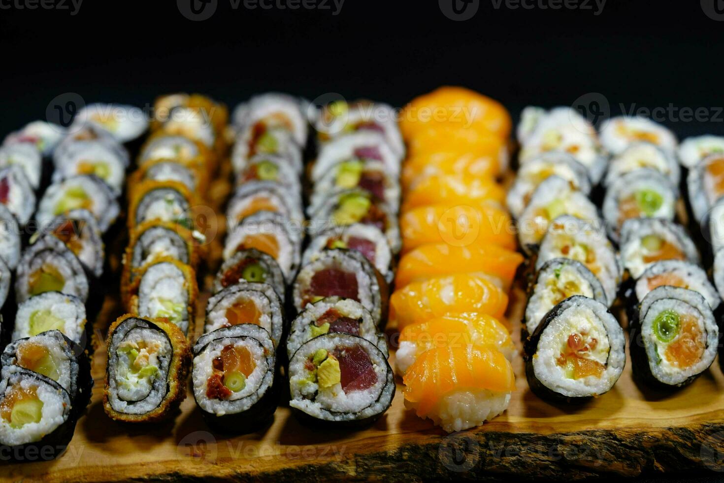 different Kinds of asia seafood sushi on a slate photo