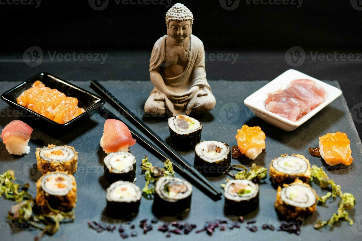 different Kinds of asia seafood sushi on a slate photo