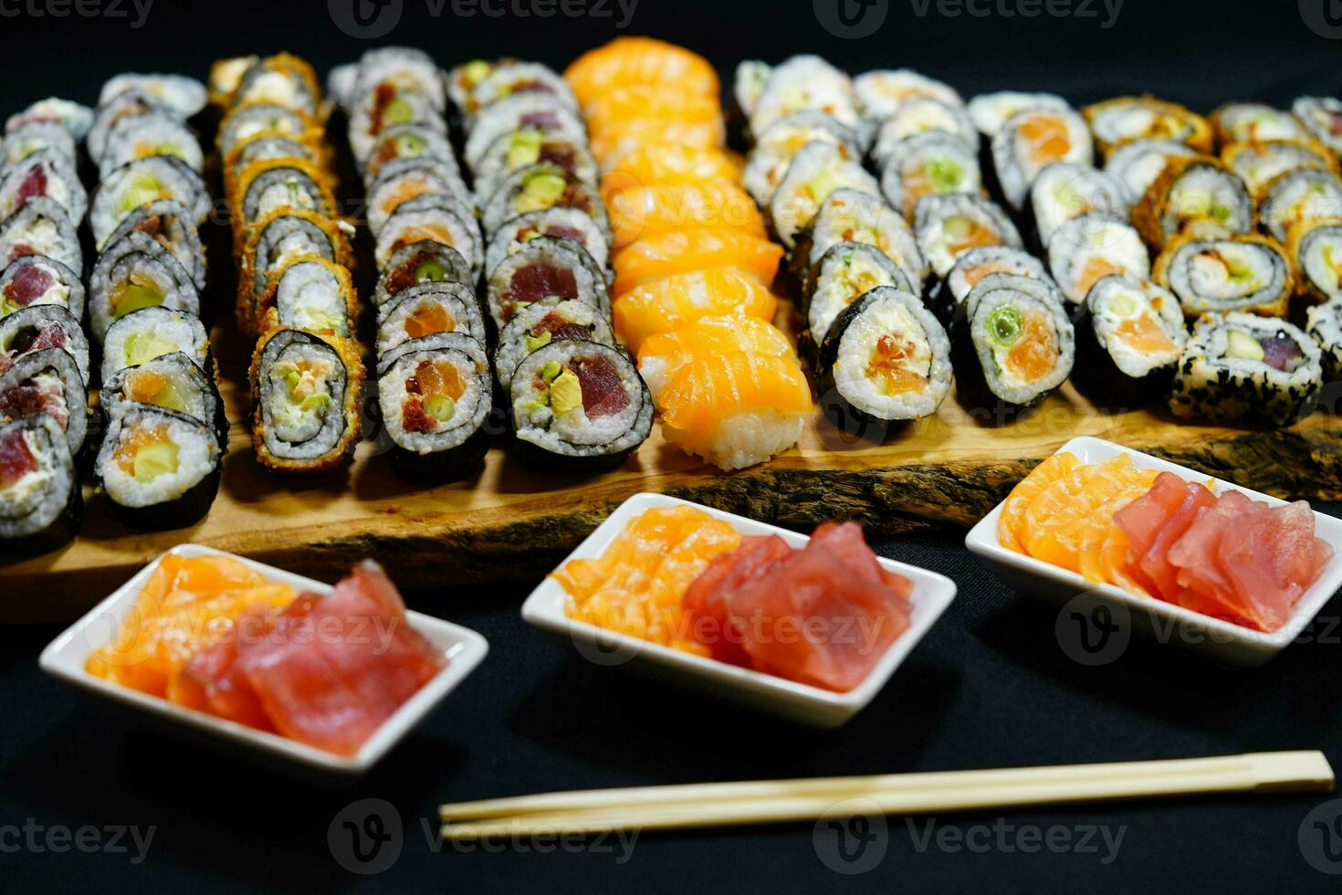 different Kinds of asia seafood sushi on a slate photo