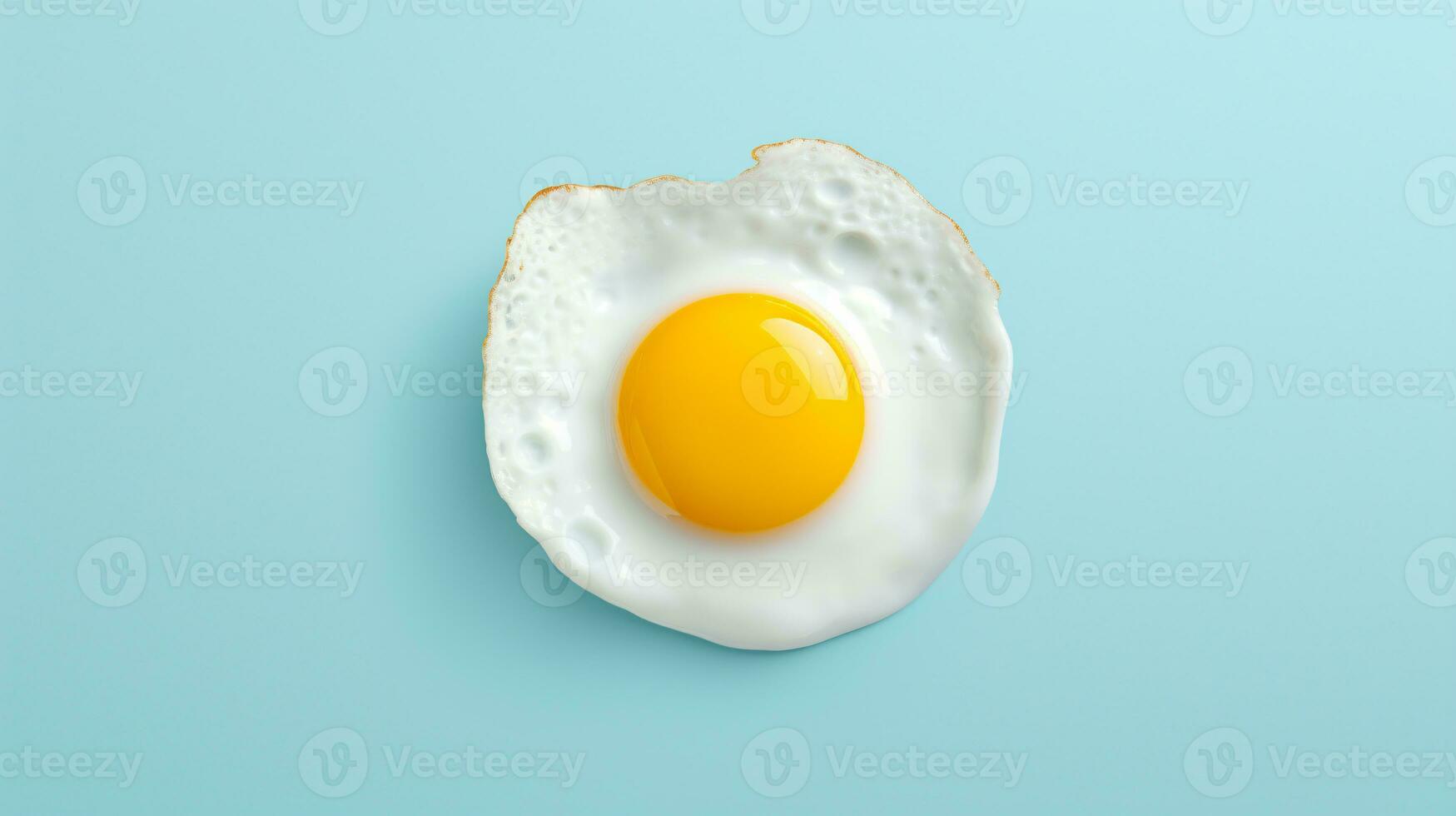 Tasty sunny side up fried egg isolated on a blue background, top view. Ai Generative photo