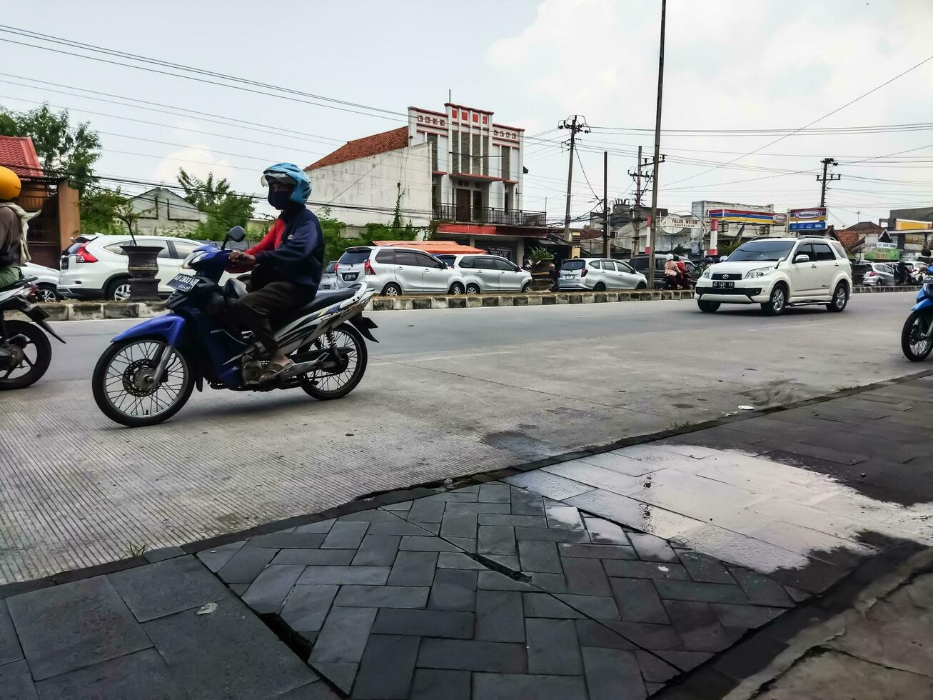 Karanganyar, Indonesia - April 24, 2023. Mudik or Pulang Kampung traffic congestion the traditions of Indonesian Muslims come to their hometowns from big cities to celebrate Eid or Lebaran photo