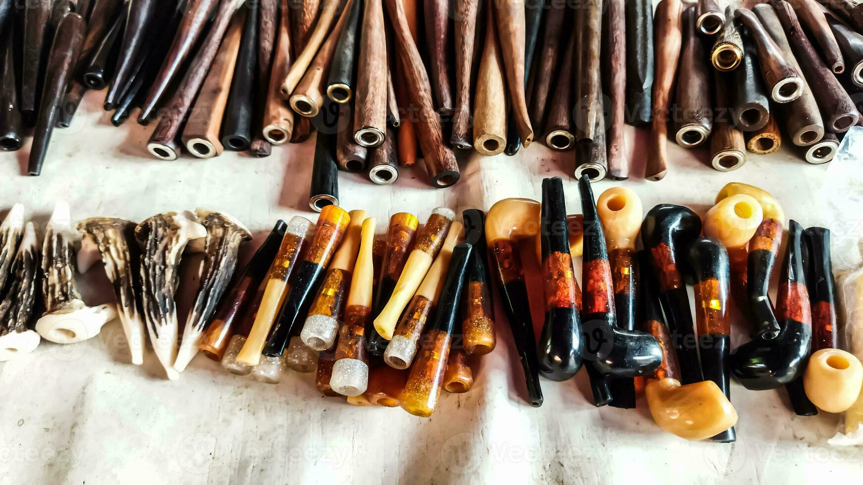 vintage collection of tobacco pipes photo