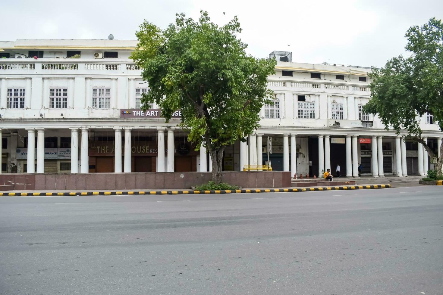 Delhi, India, March 31 2023 - Famous business district Connaught Place know as CP Delhi in the centre of New Delhi India with Offices, Banks and Shopping. British style architecture CP in Delhi, India photo
